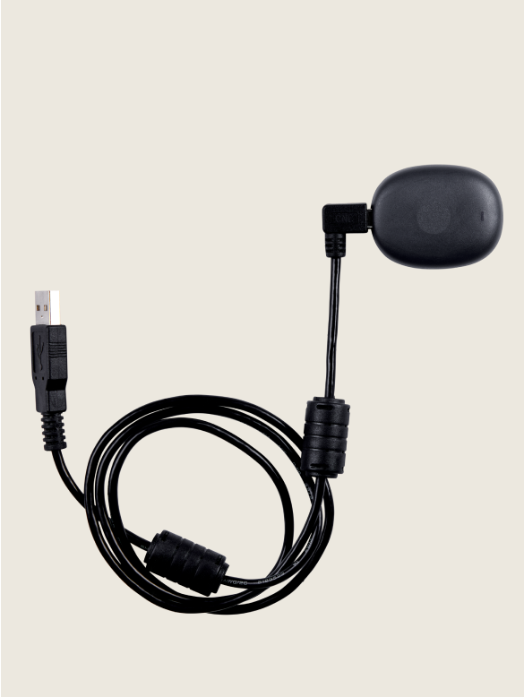 A black USB cable with CGM device